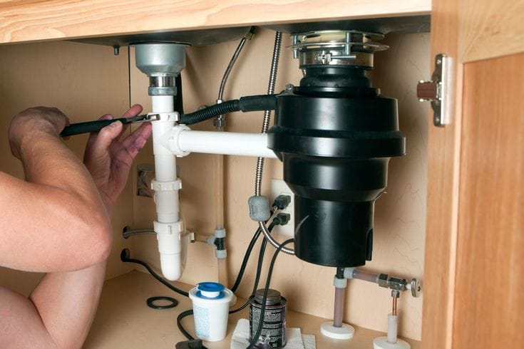 Garbage disposal installation and repair in Athens, Georgia kitchen