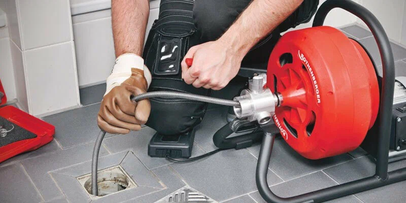 Drain cleaning service in Athens, Georgia using professional plumbing equipment