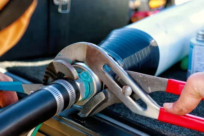 Pipe repair service using professional plumbing tools in Athens, Georgia